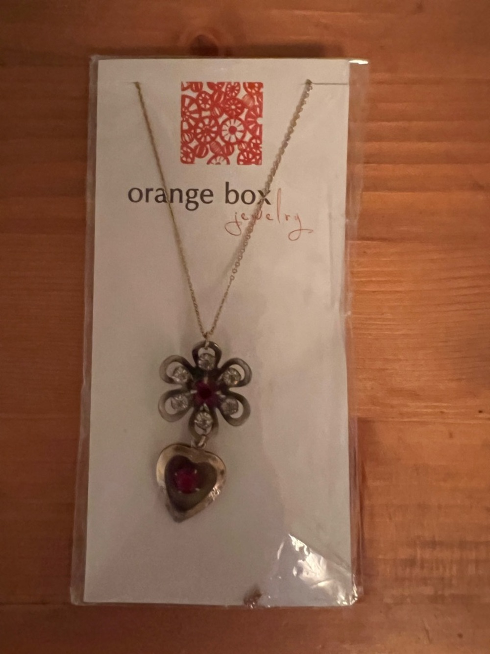 Gold-Tone Necklace with Red Accent Pendant